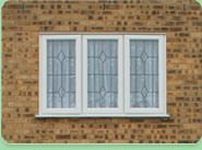 Window fitting Wimborne Minster